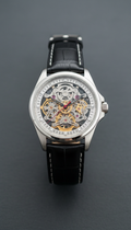 Skeleton dial watch, exposed mechanical-style face